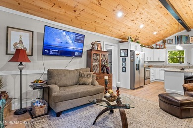 Step into spring in this warm and inviting one-level home on Druid Hills Golf Club in Tennessee - for sale on GolfHomes.com, golf home, golf lot