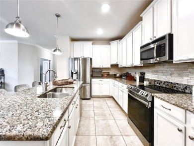 Under contract-accepting backup offers. New reduced price! on The Oasis Club at Champions Gate in Florida - for sale on GolfHomes.com, golf home, golf lot