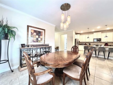 Under contract-accepting backup offers. New reduced price! on The Oasis Club at Champions Gate in Florida - for sale on GolfHomes.com, golf home, golf lot
