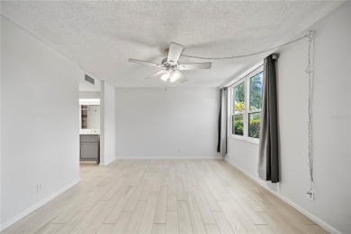 Enjoy ultimate convenience in this beautifully remodeled on Cove Cay Country Club in Florida - for sale on GolfHomes.com, golf home, golf lot