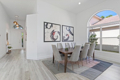 Stunningly renovated home located on two fairways of the Eagle on TPC Eagle Trace in Florida - for sale on GolfHomes.com, golf home, golf lot