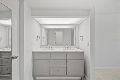 Enjoy ultimate convenience in this beautifully remodeled on Cove Cay Country Club in Florida - for sale on GolfHomes.com, golf home, golf lot