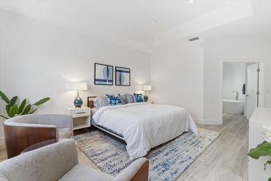 Stunningly renovated home located on two fairways of the Eagle on TPC Eagle Trace in Florida - for sale on GolfHomes.com, golf home, golf lot