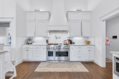 AN ABSOLUTE STUNNER LOCATED ON A TREE-LINED CUL-DE-SAC! A MODERN on Green Tree Country Club in Texas - for sale on GolfHomes.com, golf home, golf lot