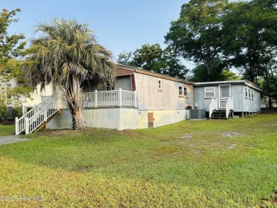 Welcome to Seaside Station in beautiful Sunset Beach, North on Oyster Bay Golf Links in North Carolina - for sale on GolfHomes.com, golf home, golf lot