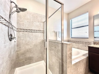 Under contract-accepting backup offers. New reduced price! on The Oasis Club at Champions Gate in Florida - for sale on GolfHomes.com, golf home, golf lot