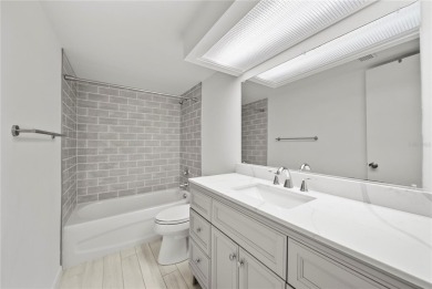 Enjoy ultimate convenience in this beautifully remodeled on Cove Cay Country Club in Florida - for sale on GolfHomes.com, golf home, golf lot