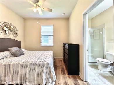 Under contract-accepting backup offers. New reduced price! on The Oasis Club at Champions Gate in Florida - for sale on GolfHomes.com, golf home, golf lot