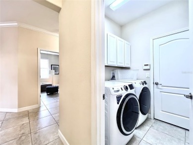 Under contract-accepting backup offers. New reduced price! on The Oasis Club at Champions Gate in Florida - for sale on GolfHomes.com, golf home, golf lot