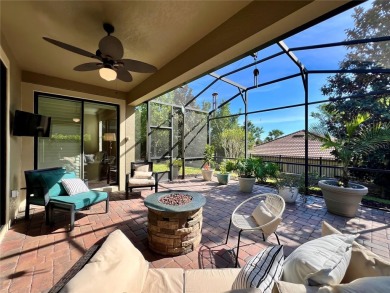 Under contract-accepting backup offers. New reduced price! on The Oasis Club at Champions Gate in Florida - for sale on GolfHomes.com, golf home, golf lot