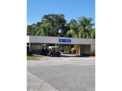 Enjoy ultimate convenience in this beautifully remodeled on Cove Cay Country Club in Florida - for sale on GolfHomes.com, golf home, golf lot