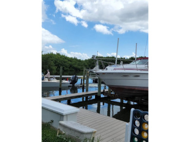Enjoy ultimate convenience in this beautifully remodeled on Cove Cay Country Club in Florida - for sale on GolfHomes.com, golf home, golf lot