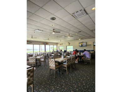 Enjoy ultimate convenience in this beautifully remodeled on Cove Cay Country Club in Florida - for sale on GolfHomes.com, golf home, golf lot