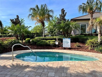 Under contract-accepting backup offers. New reduced price! on The Oasis Club at Champions Gate in Florida - for sale on GolfHomes.com, golf home, golf lot