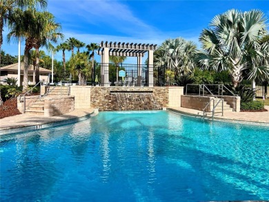 Under contract-accepting backup offers. New reduced price! on The Oasis Club at Champions Gate in Florida - for sale on GolfHomes.com, golf home, golf lot