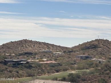 Offering panoramic views of the Red Mountain, dramatic sunsets on FireRock Country Club in Arizona - for sale on GolfHomes.com, golf home, golf lot