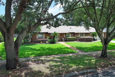 Under contract-accepting backup offers. Charming Traditional on Rio Pinar Golf and Country Club in Florida - for sale on GolfHomes.com, golf home, golf lot