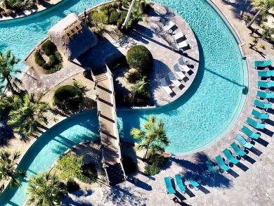 Under contract-accepting backup offers. New reduced price! on The Oasis Club at Champions Gate in Florida - for sale on GolfHomes.com, golf home, golf lot