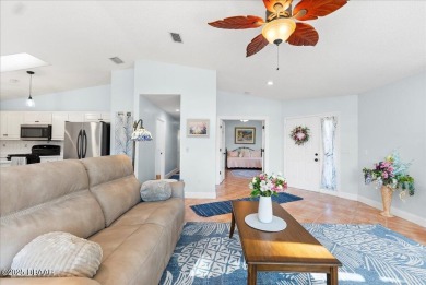 This golf community Florida Home is located on the 11th fairway on The Grand Club - Pine Lakes Course in Florida - for sale on GolfHomes.com, golf home, golf lot