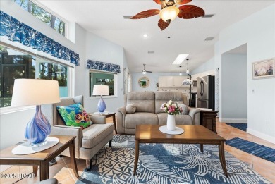 This golf community Florida Home is located on the 11th fairway on The Grand Club - Pine Lakes Course in Florida - for sale on GolfHomes.com, golf home, golf lot