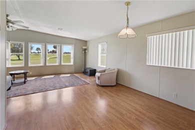 2 bed/2 bath, 1,384 sq ft of living space overlooking the Golf on Barefoot Bay Golf Course in Florida - for sale on GolfHomes.com, golf home, golf lot