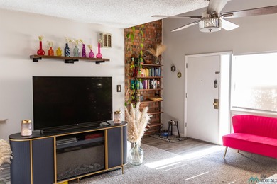 This unique loft-style townhome is a true knockout, offering on Chaparral Country Club in New Mexico - for sale on GolfHomes.com, golf home, golf lot