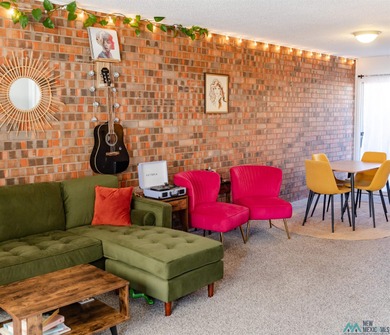 This unique loft-style townhome is a true knockout, offering on Chaparral Country Club in New Mexico - for sale on GolfHomes.com, golf home, golf lot