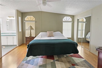 2 bed/2 bath, 1,384 sq ft of living space overlooking the Golf on Barefoot Bay Golf Course in Florida - for sale on GolfHomes.com, golf home, golf lot