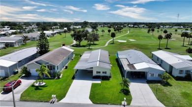 2 bed/2 bath, 1,384 sq ft of living space overlooking the Golf on Barefoot Bay Golf Course in Florida - for sale on GolfHomes.com, golf home, golf lot