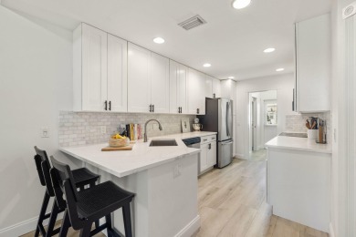 Fully Renovated Townhome with Golf Course views located in one on Abacoa Golf Club in Florida - for sale on GolfHomes.com, golf home, golf lot