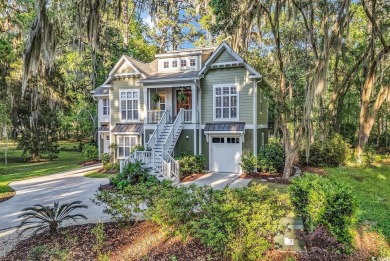 Nestled under a canopy of centuries old Angel Live Oak trees on Willbrook Plantation Golf Club in South Carolina - for sale on GolfHomes.com, golf home, golf lot