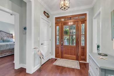 Nestled under a canopy of centuries old Angel Live Oak trees on Willbrook Plantation Golf Club in South Carolina - for sale on GolfHomes.com, golf home, golf lot