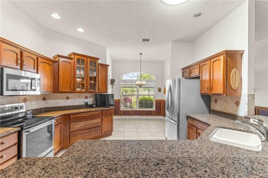 This EXPANDED BEGONIA home on a corner lot with an abundance of on Mallory Hill Golf and Country Club in Florida - for sale on GolfHomes.com, golf home, golf lot