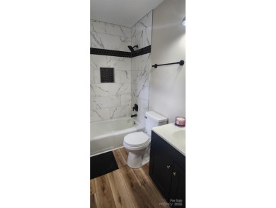 Beautifully Renovated Townhome on the Raintree Golf Course in on Raintree Country Club in North Carolina - for sale on GolfHomes.com, golf home, golf lot