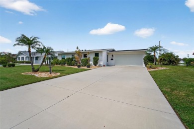 Presenting this custom-built residence overlooking the tranquil on North Lakes Golf Course in Florida - for sale on GolfHomes.com, golf home, golf lot