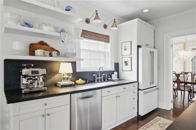 Welcome to 820 Wilson Road, a truly stunning Tudor-style home on Bobby Jones Golf Club in Georgia - for sale on GolfHomes.com, golf home, golf lot