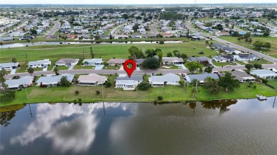 Presenting this custom-built residence overlooking the tranquil on North Lakes Golf Course in Florida - for sale on GolfHomes.com, golf home, golf lot