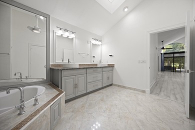 Move-in ready 3-bedroom, 2.5 bath lakefront home tucked away on on Stonebridge Golf and Country Club in Florida - for sale on GolfHomes.com, golf home, golf lot