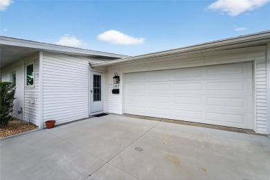 Presenting this custom-built residence overlooking the tranquil on North Lakes Golf Course in Florida - for sale on GolfHomes.com, golf home, golf lot