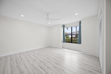 Move-in ready 3-bedroom, 2.5 bath lakefront home tucked away on on Stonebridge Golf and Country Club in Florida - for sale on GolfHomes.com, golf home, golf lot