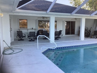 FEATURING A LARGE POOL HOME (2308 sf) WITH 3 BR, 2 BA, 2 CAR on Deep Creek Golf Club in Florida - for sale on GolfHomes.com, golf home, golf lot