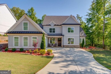 Gorgeous curb appeal for this home.  4 large bedrooms and 3.5 on Traditions of Braselton Golf Club in Georgia - for sale on GolfHomes.com, golf home, golf lot