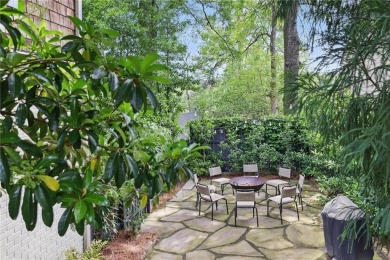 Welcome to 820 Wilson Road, a truly stunning Tudor-style home on Bobby Jones Golf Club in Georgia - for sale on GolfHomes.com, golf home, golf lot