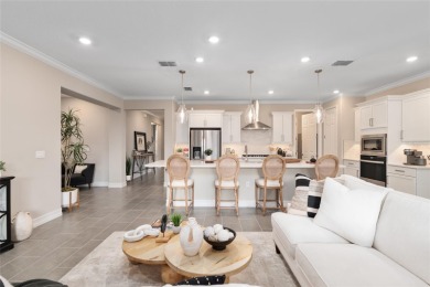 Step into the elegance and comfort of this beautifully appointed on Trilogy at Ocala Preserve in Florida - for sale on GolfHomes.com, golf home, golf lot