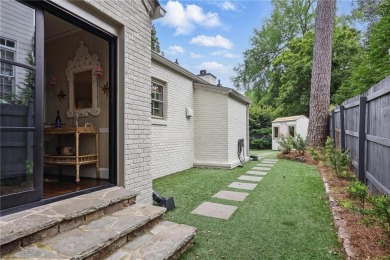 Welcome to 820 Wilson Road, a truly stunning Tudor-style home on Bobby Jones Golf Club in Georgia - for sale on GolfHomes.com, golf home, golf lot