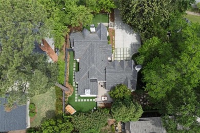 Welcome to 820 Wilson Road, a truly stunning Tudor-style home on Bobby Jones Golf Club in Georgia - for sale on GolfHomes.com, golf home, golf lot