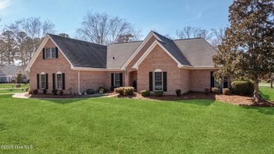 Experience luxury living in this exquisite home nestled in the on Sound Golf Links at Albemarle Plantation in North Carolina - for sale on GolfHomes.com, golf home, golf lot