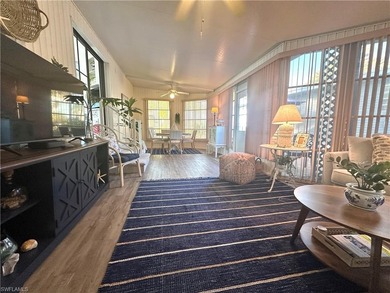 This charming cottage-style mobile home is located in the serene on Copperleaf Golf Club in Florida - for sale on GolfHomes.com, golf home, golf lot