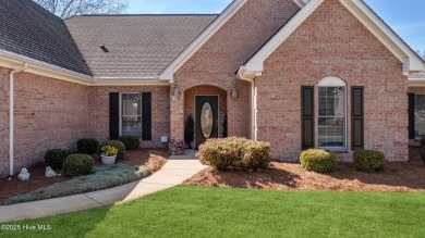 Experience luxury living in this exquisite home nestled in the on Sound Golf Links at Albemarle Plantation in North Carolina - for sale on GolfHomes.com, golf home, golf lot