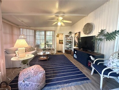 This charming cottage-style mobile home is located in the serene on Copperleaf Golf Club in Florida - for sale on GolfHomes.com, golf home, golf lot